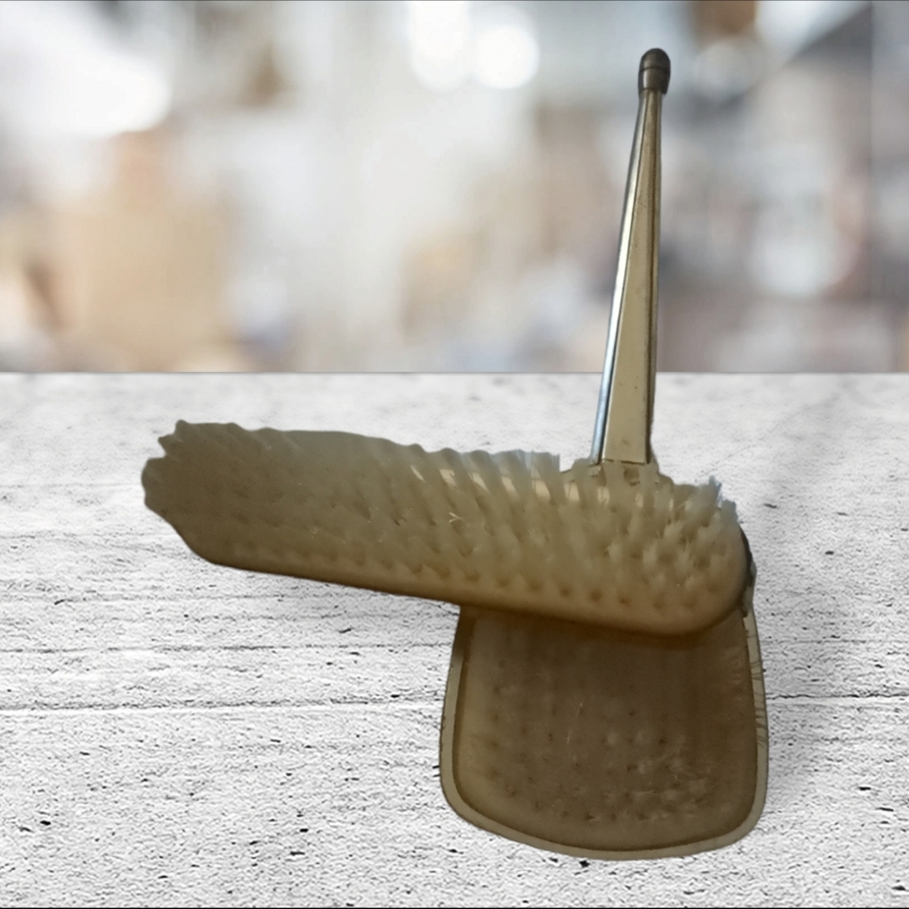 Vintage clothes and hair brush